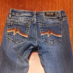 Miss Me embroidered pocket jeans.